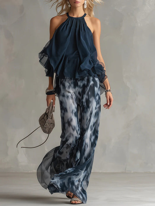 Tania - Top blu navy con scollo a halterneck e pantaloni palazzo stampati in chiffon - completo coordinato