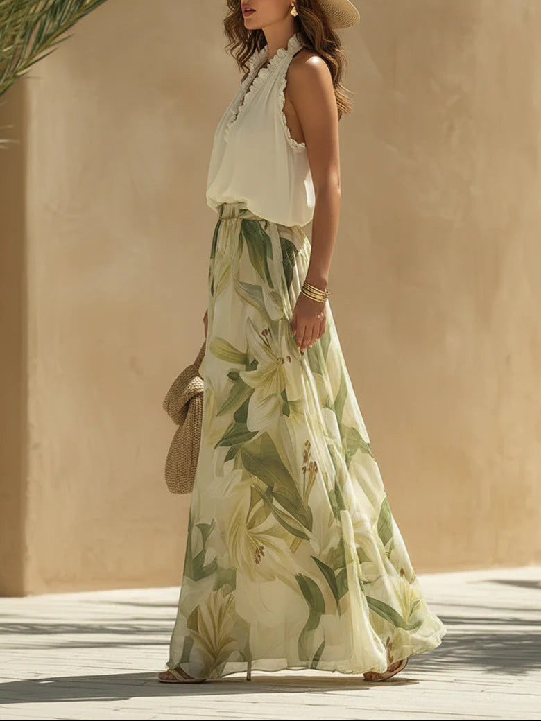 Cinzia - Completo da vacanza con top in chiffon senza maniche e volant e pantaloni a stampa di gigli
