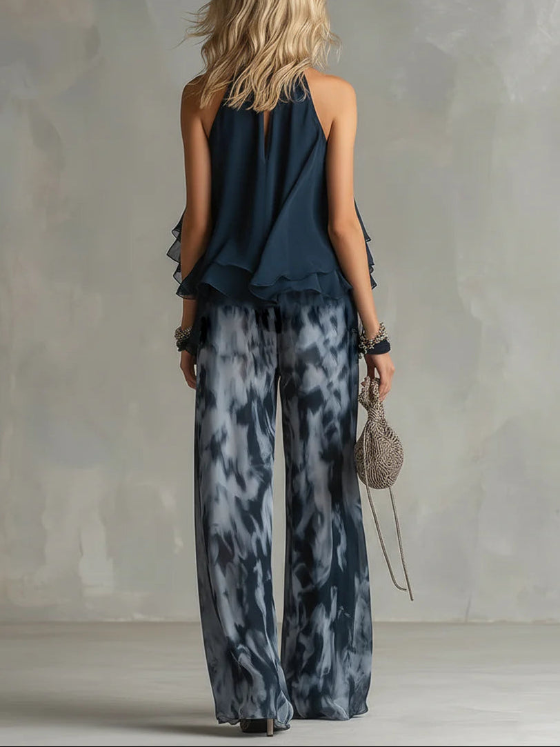 Tania - Top blu navy con scollo a halterneck e pantaloni palazzo stampati in chiffon - completo coordinato