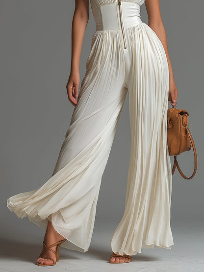 Evelina - Tuta in chiffon bianco con scollo a V, senza maniche, zip frontale, plissé, gamba ampia