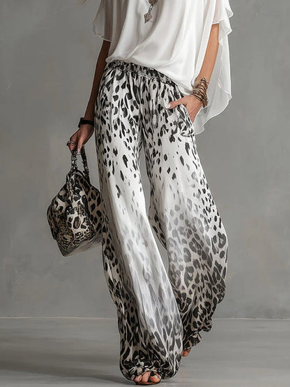Mirabella - Set maglietta bianca fluida e pantaloni in chiffon con stampa leopardata