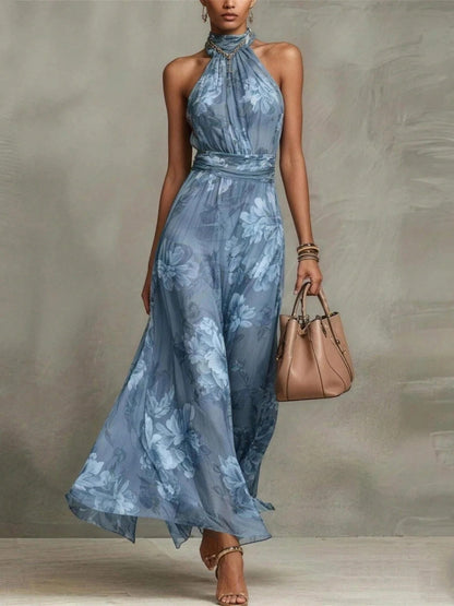 Fiora | Abito lungo in chiffon verde con stampa floreale e scollo all'americana.
