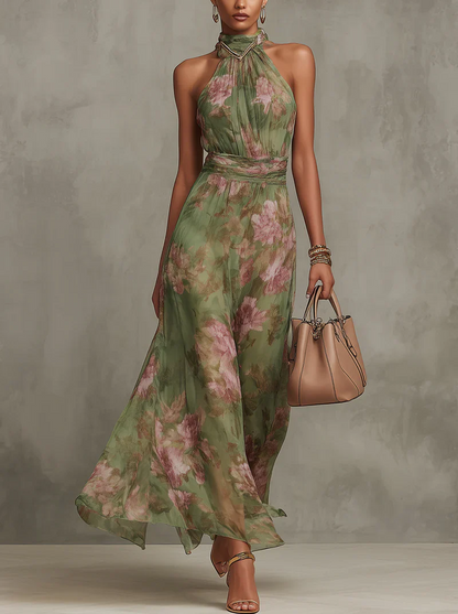 Fiora | Abito lungo in chiffon verde con stampa floreale e scollo all'americana.