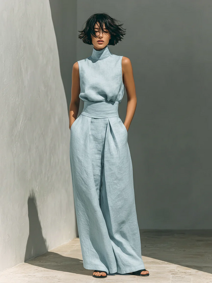 LUCIA | Completo da donna in misto cotone e lino dallo stile minimalista, composto da camicetta senza maniche e pantaloni a gamba larga.