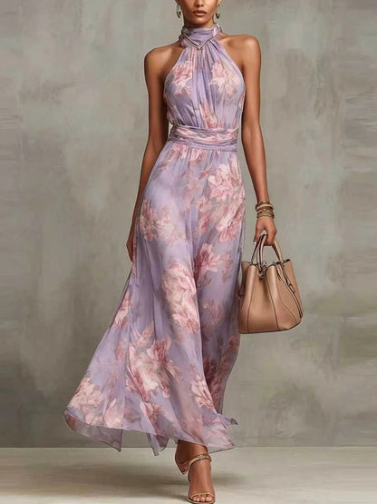 Fiora | Abito lungo in chiffon verde con stampa floreale e scollo all'americana.